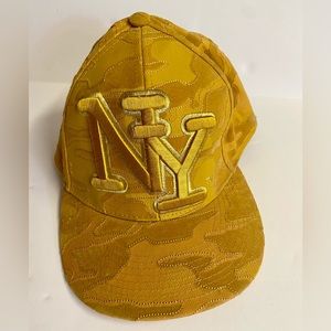 City Hunter XL Gold New York Embroidery on front and back.Camo pattern.